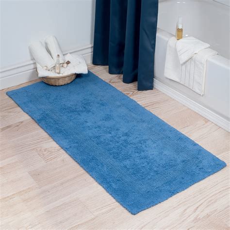 long area rug in bathroom instead of small bath mats. Fairfax Bath Rug. Bath rugs and mats. Bath rug for contemporary indoors. This element of bathroom design is finished in very nice blue color with some decorative accents. This material is resistant to water, moisture and other negative bathroom factors.